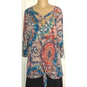 Lilypad Multicolor Tunic crisscross detail on neckline. Knot tie on hem